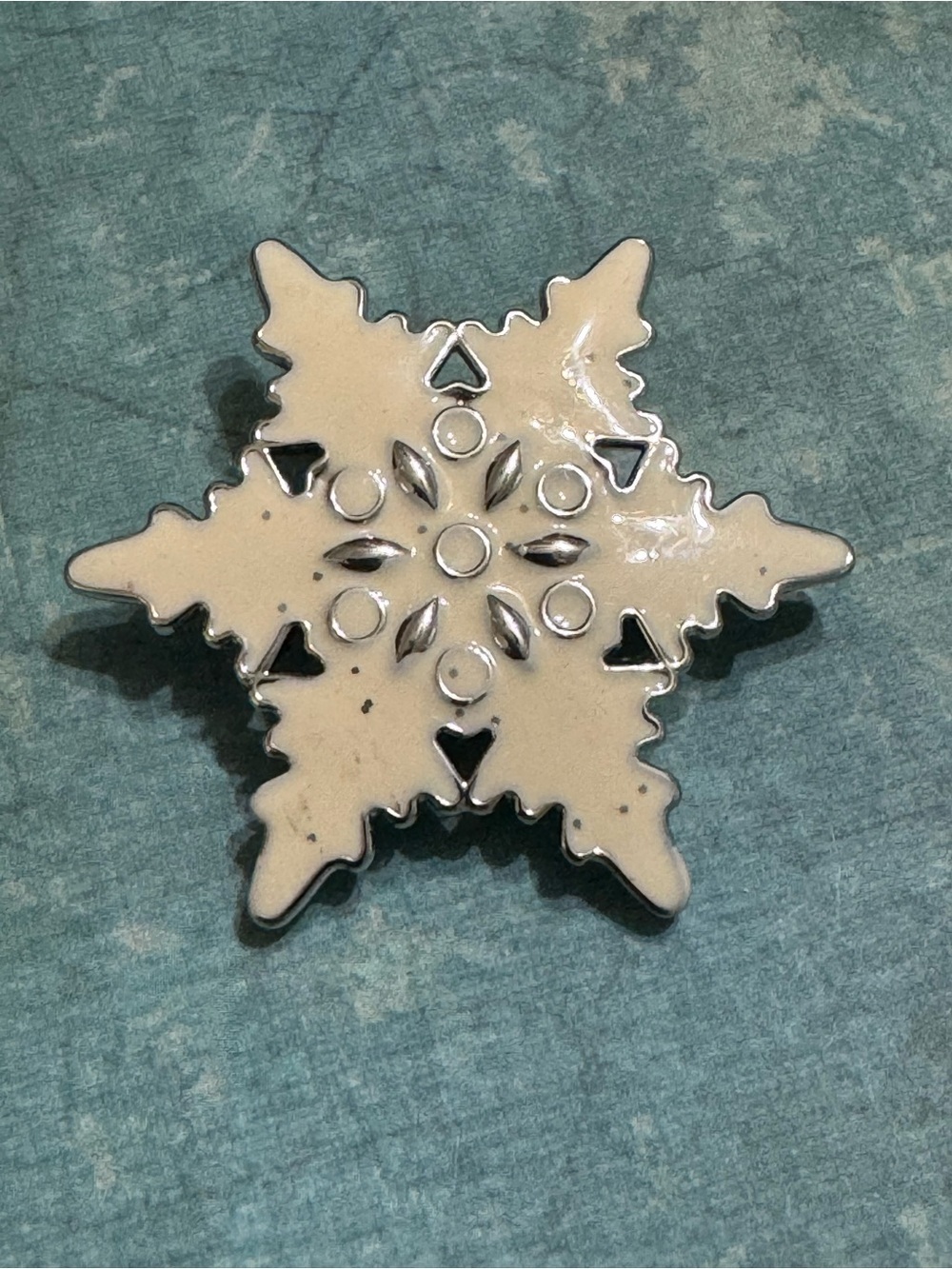 ENAMELED SNOWFLAKE BROOCH